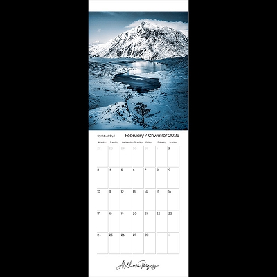calendar cover for Febrauary - view of a lake and snowed cap mountain in the background