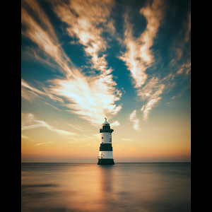 Sunset at Trwyn Du lighthouse in Penmon, Anglesey.