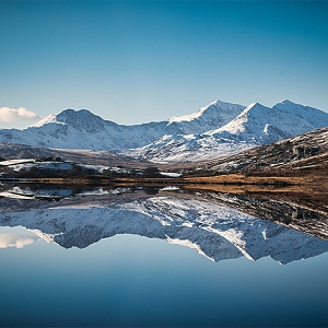 Snow capped photo of Yr Wyddfa (Snowdon) in the Eryri / Snowdonia National Park, Wales.