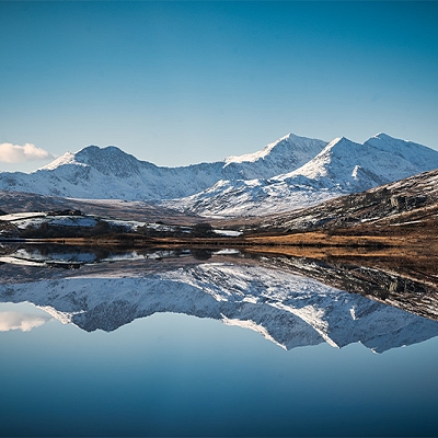 Snow capped photo of Yr Wyddfa (Snowdon) in the Eryri / Snowdonia National Park, Wales.